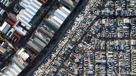 Aerial image of Cape Town contrasting a township against a business park